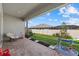 Cozy backyard with a paved patio area, lush grass, and well-maintained landscaping at 17676 Savory Mist Cir, Bradenton, FL 34211