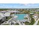 Resort-style community pool with ample seating, lush landscaping, and clubhouse in a desirable neighborhood at 17676 Savory Mist Cir, Bradenton, FL 34211