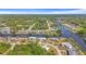 A beautiful waterfront home situated on an oversized lot in a quiet residential neighborhood with canals at 18399 Burkholder Cir, Port Charlotte, FL 33948