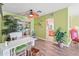 Spacious room featuring a sliding glass door with outdoor access at 18399 Burkholder Cir, Port Charlotte, FL 33948