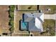 Aerial view showcasing the pool and outdoor living space at 19990 Midway Blvd, Port Charlotte, FL 33948