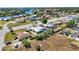Aerial view of residential homes close to a scenic river, emphasizing the allure of waterfront living at 19990 Midway Blvd, Port Charlotte, FL 33948