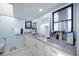 Bathroom features a double vanity with granite countertops at 19990 Midway Blvd, Port Charlotte, FL 33948