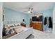Bright bedroom with a large dresser, and marble floors at 19990 Midway Blvd, Port Charlotte, FL 33948