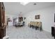 Open-concept dining area with marble floors and stylish furniture at 19990 Midway Blvd, Port Charlotte, FL 33948