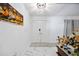 Bright entrance foyer featuring double doors and marble flooring, offering a welcoming first impression at 19990 Midway Blvd, Port Charlotte, FL 33948