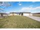 Nice home with a two-car garage and a lovely yard at 19990 Midway Blvd, Port Charlotte, FL 33948