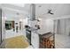 Open kitchen features granite countertops, stainless steel hood, and recessed lighting at 19990 Midway Blvd, Port Charlotte, FL 33948