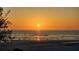 Scenic beach at sunset, perfect for evening strolls and relaxing by the water at 20 Whispering Sands Dr # 406, Sarasota, FL 34242