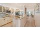 Modern kitchen with stainless steel appliances, granite countertops, and ample cabinet space at 20 Whispering Sands Dr # 406, Sarasota, FL 34242
