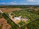 Aerial view of a large treed lot with a home foundation at 22520 61St E Ave, Bradenton, FL 34211