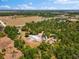 Expansive property featuring lush trees, potential building sites, and serene surroundings at 22520 61St E Ave, Bradenton, FL 34211