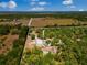 Aerial view of a large treed lot with a home foundation at 22520 61St E Ave, Bradenton, FL 34211