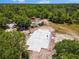 Aerial view of a home foundation on a wooded lot at 22520 61St E Ave, Bradenton, FL 34211
