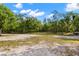A large lot of land with mature trees and lots of room to build at 22520 61St E Ave, Bradenton, FL 34211