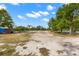 The property features a lot with lots of mature trees and an abundance of space to build at 22520 61St E Ave, Bradenton, FL 34211