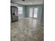 Spacious kitchen featuring stainless steel appliances and an exterior entrance at 2510 N Osprey Ave, Sarasota, FL 34234