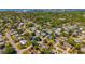 Aerial view showing a residential neighborhood with tree-lined streets, highlighting the property's location at 2610 Jefferson Cir, Sarasota, FL 34239
