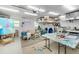 Bright art studio with large windows, seating area, art supplies and equipment for creating masterpieces at 2610 Jefferson Cir, Sarasota, FL 34239