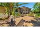 Tranquil backyard patio offers comfortable seating and lush surroundings, perfect for relaxation and outdoor living at 2610 Jefferson Cir, Sarasota, FL 34239