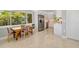 Spacious kitchen features modern stainless steel appliances, bright lighting, and garden views at 2610 Jefferson Cir, Sarasota, FL 34239