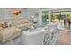 Comfortable living room with stylish decor, natural light, and an open layout at 2610 Jefferson Cir, Sarasota, FL 34239
