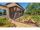Inviting screened-in porch with backyard view, perfect for enjoying the outdoors while staying protected at 2610 Jefferson Cir, Sarasota, FL 34239
