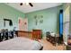 room with a desk, dresser, and bed; adorned with playful accents at 2707 162Nd E Ave, Parrish, FL 34219