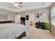 Primary bedroom with en-suite bathroom, walk-in closet, and sitting area, providing a private sanctuary at 2707 162Nd E Ave, Parrish, FL 34219