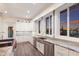 Bright kitchen featuring stainless steel appliances, granite countertops, with an eat in island at 327 Riverpoint Ne Dr, Bradenton, FL 34208