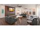 Bright living room boasts modern furniture, waterfront views, and sleek design elements at 327 Riverpoint Ne Dr, Bradenton, FL 34208