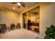 Covered patio with views into the dining and living areas, perfect for entertaining at 3520 Woodmont Dr, Parrish, FL 34219
