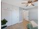 This bedroom features closet space, a bed, a ceiling fan, and a plant at 3828 20Th N St, St Petersburg, FL 33714
