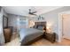 Comfortable bedroom with natural light, gray walls and wood furniture at 3828 20Th N St, St Petersburg, FL 33714