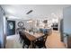 Open concept layout with a dining area, kitchen, and views of the front door at 3828 20Th N St, St Petersburg, FL 33714