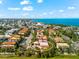 Aerial view of the property showcasing its proximity to the ocean and surrounding neighborhood at 4001 5Th Ave, Holmes Beach, FL 34217
