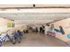 Spacious garage with ample storage space, bikes, beach chairs, and room for multiple cars at 4001 5Th Ave, Holmes Beach, FL 34217