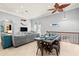 Open-concept living room and dining area with neutral tones and ample seating at 4001 5Th Ave, Holmes Beach, FL 34217