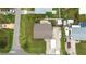 Aerial view of a home showcasing the backyard, boat parking, and surrounding neighborhood at 4221 3Rd W Ave, Palmetto, FL 34221