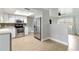 Modern kitchen features white cabinets, stainless steel appliances, and a stylish backsplash at 4221 3Rd W Ave, Palmetto, FL 34221