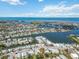 Expansive aerial view of waterfront community with private boat docks, surrounding ocean, and ample housing at 424 62Nd St, Holmes Beach, FL 34217