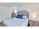 Serene bedroom featuring a comfortable bed, soothing colors, and natural light at 424 62Nd St, Holmes Beach, FL 34217