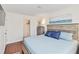 Cozy bedroom featuring a comfortable bed, soothing colors, and closet space at 424 62Nd St, Holmes Beach, FL 34217