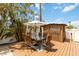 Outdoor dining area featuring a table, chairs, and a bar area at 424 62Nd St, Holmes Beach, FL 34217