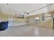 Spacious garage with ample storage, shelving, and room for parking two vehicles at 4344 Nizza Ct, Venice, FL 34293