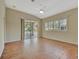 Inviting living area with sliding doors to a screened lanai and serene water views at 4344 Nizza Ct, Venice, FL 34293