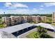 Aerial view of the condominium complex with parking garage in foreground at 4440 Fairways Blvd # 210, Bradenton, FL 34209
