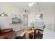 Inviting living room with stylish furniture, artwork, and ample natural light at 4440 Fairways Blvd # 210, Bradenton, FL 34209