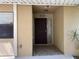 A well-maintained entryway showcases the home's inviting appeal and detailed architectural accents at 4944 Village Gardens Dr # 151, Sarasota, FL 34234