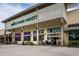 Exterior view of Whole Foods Market with modern architecture and ample parking at 4944 Village Gardens Dr # 151, Sarasota, FL 34234